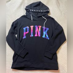 Black Hoodie With The Dye Writing. Has Pink Written Around Hood. Never Worn, No Tags. Fits Big. Pink Hooded Outerwear With Letter Print, Pink Fall Hoodie With Adjustable Hood, Pink Hoodie With Adjustable Hood For Fall, Fall Pink Hoodie With Adjustable Hood, Pink Sweatshirt With Adjustable Hood For Sports, Trendy Pink Fleece Outerwear, Trendy Pink Sports Hoodie, Trendy Pink Hoodie For Sports, Trendy Pink Hoodie With Adjustable Hood