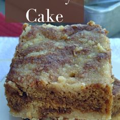 two pieces of cake sitting on top of a white plate