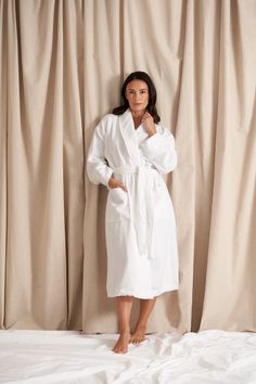 Indulge in ultimate luxury with our premium Bamboo Towelling Robe, meticulously crafted for superior comfort and style. This ultra-luxurious robe ensures an unparalleled lounging experience with features like an internal tie for extra security, an adjustable waist tie for a snug fit, and a tonal feature panel on the sleeves for added sophistication. Made from a luxurious blend of 35% FSC Certified Bamboo and 65% sustainably sourced long-staple cotton, this robe offers superior softness and absorbency, maintaining its fluffy and gentle feel wash after wash. The 400GSM weight provides a thick, cosy, and indulgent experience, perfect for lounging or after-bath comfort. Certified by the Oeko-Tex Made in Green standard, our robe is crafted with sustainability in mind, ensuring environmentally f Elegant White Robe For Relaxation, Elegant White Lounging Robe, Mens Nightwear, Sleep Accessories, Dressing Gown Robe, Jumpsuit Men, Cami Set, Nightwear Women, Gym Tops