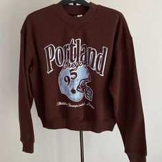 Nwt H&M Brown Portland Print Sweatshirt Size Medium Made Of Recycled Cotton And Polyester Brown Cotton Sweatshirt With Letter Print, Brown Oversized Graphic Print Sweatshirt, Hm Sweatshirt, Brown Graphic Print Crew Neck Sweatshirt, Brown Graphic Print Long Sleeve Sweatshirt, Brown H&m Sweater, Chunky Pullover Sweater, Hm Sweater, Red Cable Knit Sweater