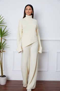 Features: Basic style Number of pieces: Two-piece Stretch: Moderate stretch Material composition: 30% polyester, 50% viscose, 20% nylon Care instructions: Machine wash cold. Tumble dry low. Imported Product measurements:One Size:Bust 27.95 in, Shoulder 22.05 in, Sleeve Length 20.87 in, Top Length 27.95 in, HIP 39.37 in, Bottom Length 42.52 in About Us: Welcome to Lizzie's! We hope you find unique pieces you'll love for years! We've been in the fashion business since 2016. You'll love our product Modest Daily Outfits, Elegant Lounge Wear, Cute Lounge Wear, Winter Outfit Ideas For Women, Sweater Two Piece Set, Corporate Dress, Drop Shoulder Top, Hijabi Outfits, Effortless Elegance