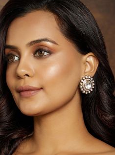 Classic Kundan Polki Stud - Joules By Radhika This classic stud earrings is made with a far size polki in the centre surrounded with fancy polkis & zirconia diamonds in gold tone. Ideal to be worn on festive, wedding & party occassions on your Indian & fusion attire. Every artistic piece from Joules by Radhika is made with real semi precious stones only, giving it a regal look & feel. SET INCLUDES: Studs Details: Handcrafted with ❤️ Metal: Brass Product Type: Studs Stone: Hydro Polkis Plating: 2 Kundan Polki Earrings, Polki Diamond Earrings, Earrings For Saree, Bridal Jewellery Online, Indian Bridal Jewelry, Festive Wedding, Polki Earrings, Bridal Jewellery Indian, Semi Precious Stones