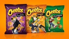 three bags of cheetos are shown on an orange background