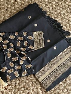 "❤️❤️❤️ Royal Black Banarasi Katan ❤️❤️❤️ Absolutely Gorgeous Unique Designer Pure Katan silk saree with all over Chaand Tara ( Ek Taara) woven kaduwa Butties and kaddi borders. The Saree has woven Kaddi Borders and Amazing Pallu with Geometric patterns of weaving in Antique Gold Zari. Perfect outfit for a Date Nights or for any Formal Events. Pair it up with a simple Black or a Golden clutch to make this look more Stunning. *Fall, Pico & Tassels : Done *Condition : New Saree With Stitched Blous Traditional Lehenga With Zari Work In Cotton Silk, Unstitched Embroidered Fabric For Traditional Drape, Eid Unstitched Cotton Silk Choli, Semi-stitched Black Art Silk Blouse Piece, Unstitched Cotton Silk Choli For Festivals, Unstitched Eid Blouse With Zari Work, Art Silk Embroidered Blouse For Traditional Ceremonies, Designer Raw Silk Blouse Piece For Eid, Unstitched Anarkali Blouse For Eid