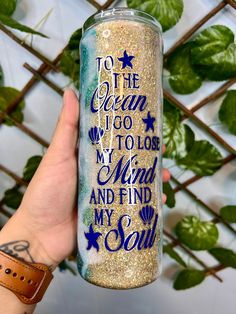 "This tumbler was a labor of love ❤️ Hand glittered with 6 different glitters to give you the gorgeous beach theme.  \"To the ocean I go to lose my mind and find my soul\" is the perfect quote for that beach lover. this is a finished product and CANNOT be customized. keeps drinks hot and cold  comes with lid and straw" Custom Water Bottles Ideas, Beach Themed Tumblers, Beach Glitter Tumbler, Tumbler Cups Ideas For Women, Summer Tumbler, Yeti Cup, Glitter Tumbler Cups, Custom Water Bottles, Custom Tumbler Cups