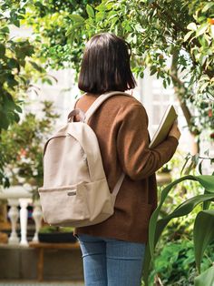 Editor's NotesBag Pack for Casual is a convenient and simple backpack with a pocket for storing a laptop up to 15 in. and papers, and a holder for water bottles on the inside, and a zipper pocket with two open pockets on the outside. The rear pocket can be used as a luggage sleeve that can be fixed to the carrier by opening the zipper at the bottom. - Lightand durable- Double-zipper closure- Padded Shoulderstraps -Waterproof- 4colors Measurements(in.)- 11 in.(W Everyday Softback Bag With Water Bottle Pocket, Everyday Backpack With Water Bottle Pocket, Everyday Softback Backpack With Water Bottle Pocket, Functional Everyday Bags For Back To School, Person Wearing Backpack, Wearing Backpack, Simple Backpack, Bag Pack, W Concept