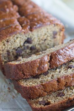 sliced loaf of banana bread sitting on top of a table