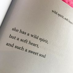 an open book with the words she has a wild spirit, but a soft heart, and such a sweet soul