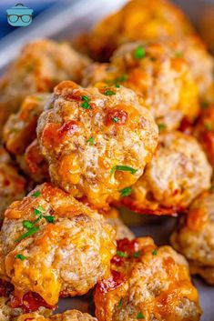 meatballs stuffed with cheese and parsley on a serving platter, ready to be eaten