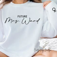 a woman wearing a white shirt with the words future mrs word printed on it