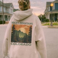 We produce the best quality designs for you like Rocky Mountains Hoodie. Enjoy comfort and elegance.  Size: If you like a comfortable fit, you can increase your size selection by one size. If you're slim cut lover, please please make one size smaller. Wash Care Instruction: Please wash the product with cold water and turn inside out. Please do not dry at high temperature. Do not apply high pressure to the printing part while ironing on the product. If possible, iron the printing part on the baki Trendy Long Sleeve Hoodie For Outdoor, Long Sleeve Hoodie With Graphic Print For Leisure, Graphic Print Long Sleeve Hoodie For Leisure, Trendy Long Sleeve Sweatshirt For Outdoor, Trendy Long Sleeve Outdoor Sweatshirt, Graphic Print Hoodie Sweatshirt For Leisure, Leisure Graphic Print Hoodie Sweatshirt, Casual Outdoor Hoodie With Graphic Print, Casual Graphic Print Hoodie For Outdoor