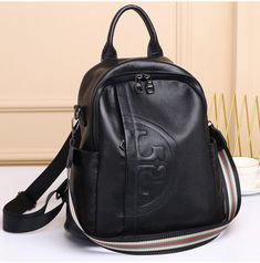 cmsize : 31 *13*30cm Main Material: Genuine LeatherGenuine Leather Type: Cow LeatherLining Material: PolyesterBackpacks Type: SoftbackInterior: Cell Phone PocketInterior: Interior Zipper PocketHandle/Strap Type: Soft HandleExterior: Silt PocketDecoration: NONEClosure Type: zipperTechnics: EmbossingCapacity: Below 20 LitreItem Type: BackpacksCarrying System: CRGender: WOMENRain Cover: NoModel Number: Black Leather Backpack B007Style: FashionPattern Type: Solidstyle1: Real leather backpack womenstyle2: travel Ladies Backpack Genuinestyle3: Ladies Backpack Real leatherstyle4: back packs bag for womenstyle5: black Feminina backpack Real leatherstyle6: Cowhide leather backpack women Leather Backpack Purse, Student Bag, Women Leather Backpack, Black Leather Backpack, Women Travel, Genuine Leather Bags, Satchel Purse, Backpack Purse, Black Backpack