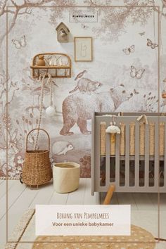 a baby crib in front of a wallpaper with bears and trees on it