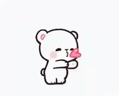 a white teddy bear holding a heart in its paws with the caption i love you