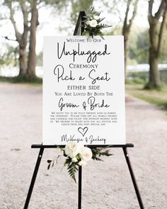 a wedding welcome sign with flowers on it