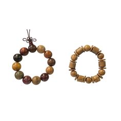 This is a set of two rosary / praying bracelets with natural mixed brown color beads.  It uses a semi-elastic string and no opening knot. The wood has its natural dense wood grain pattern on the surface.   Dimensions: bead dia 0.75" , 12 beads , semi-elastic string. Inside circle approx dia 2.5" Origin: China Material: natural wood Condition: natural wood pattern, minor lines   For all USA domestic continental customers (from 48 states), there is a flat shipping fee of $20 which includes insuran Brown Wooden Bracelet With 8mm Beads, Brown Wooden Bracelets With Round Beads, Brown Wood Beaded Bracelets, Brown Wooden Beaded Bracelets With 8mm Beads, Brown Wooden Beads Bracelets For Healing, Wooden Beads Rosary Bracelet For Meditation, Meditation Rosary Bracelet With Wooden Beads, Brown Rosary Bracelet With 8mm Beads For Meditation, Brown Rosary Bracelet For Meditation