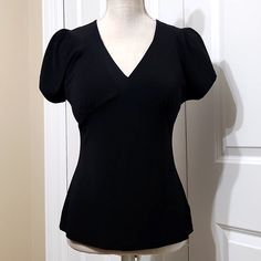 Questions? Leave A Comment Below!Worthington Black Petite Stretch Top Sz M. New Without Tags In Excellent Condition Polyester Spandex Blend See Measurements In Pics Stretch Top, Clueless, Black Shorts, Short Sleeve Top, Polyester Spandex, Short Sleeves Tops, Sleeve Top, Conditioner, Spandex