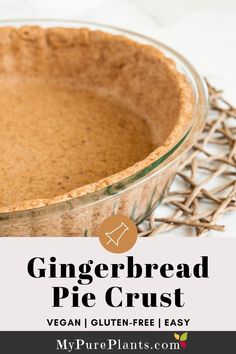 a close up of a pie crust in a glass dish with text overlay reading gingerbread pie crust vegan / gluten - free easy