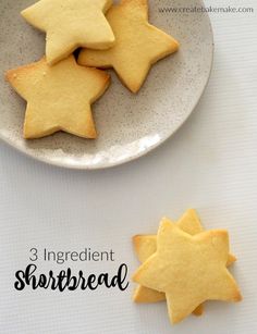 three star shaped shortbread cookies on a plate with the words, 3 ingredient shortbread