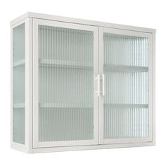 a white cabinet with glass doors is shown