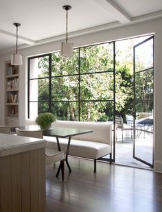 the kitchen is clean and ready to be used as a dining room or living room