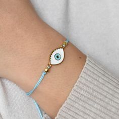 Discover the protective power of an evil blue eye bracelet. Choose from Greek Mati, Turkish Eye, and more for stylish defense. Wearing an evil blue eye bracelet is more than just a fashion statement; it's a symbol of protection against negative energy and ill intentions. The concept of the evil eye, also known as "mati" in Greek culture, dates back thousands of years and is deeply rooted in various cultures around the world. The evil eye bracelet, adorned with a mesmerizing blue eye, is believed Blue Evil Eye Bracelets, Blue Evil Eye Bracelet Gift, Blue Resizable Spiritual Evil Eye Bracelet, Turquoise Evil Eye Bracelet As Gift, Handmade Blue Evil Eye Bracelet, Symbolic Evil Eye Bracelet For Friendship, Adjustable Turquoise Bracelets With Evil Eye, Adjustable Turquoise Evil Eye Bracelet, Blue Eye Bracelet