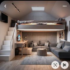 the loft bed is built into the wall above the couch and under the stairs to the second floor