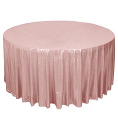 a round table covered in pink cloth