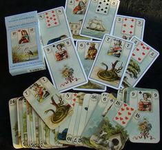 a collection of playing cards from the victorian era