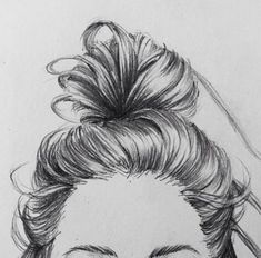 a pencil drawing of a woman's face with her hair pulled back in a bun