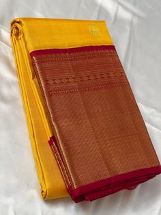 Bridal Collection Yellow Color Pure Kanchipuram Silk Saree | Indian Traditional Ethnic Saree | Wedding or Party Wear Saree | Handwoven Gift Saree for Her Product Details : Saree Type : Pure Kanchipuram Silk Saree Golden Zari, Silk Mark Certified Blouse Piece : Yes (Un-Stitched) Saree Length : 5.5 Meters Blouse Piece Length : 80 cm Saree Weight : 0.9 kg Saree Fabric : Pure Kanchipuram Silk  Color : As shown in the picture Work : weaving Pattern : designer Occasion: Party Wear, Formal Wear, Festiv Ceremonial Gold Lehenga In Paithani Silk, Yellow Handloom Saree For Wedding, Ceremonial Gold Paithani Silk Lehenga, Anarkali Lehenga With Border For Puja, Anarkali Traditional Wear With Border For Puja, Gold Chanderi Saree For Ceremonial Occasions, Gold Handloom Lehenga For Traditional Ceremonies, Gold Traditional Wear With Border For Diwali, Paithani Silk Traditional Wear With Border For Wedding