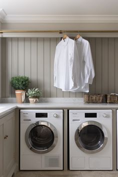 a washer and dryer in a small room