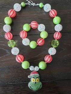 How the Grinch Stole Christmas Inspired Children's Chunky Bubblegum Bead Necklace & Bracelet Set/ Ho Festive Christmas Beads With Round Shape, Adjustable Green Beads For Festive Occasions, Adjustable Green Jewelry For Holiday, Adjustable Green Jewelry For Holidays, Pink Adjustable Christmas Jewelry, Handmade Jewelry For Christmas And Birthday, Handmade Jewelry For Birthday And Christmas, Adjustable Beaded Necklace For Christmas, Multicolor Round Beads Christmas Jewelry