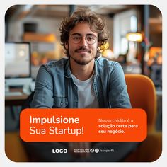 a man sitting at a table with an orange sign in front of him that says impulsione sua start up