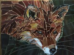 a mosaic painting of a fox on a wall