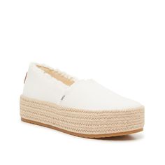 TOMS-Valencia Espadrille Slip-On - Women's Add free-spirited vibes to your 'fit with the Valencia slip-ons from Toms. The braided espadrille detail along the midsole and the fringe trim exudes boho-inspired vibes that complement the look. About the Brand: Toms believes in a future where all people have the chance to thrive! Toms invests one-third of their profits in support of grassroots efforts , partnering with organizations at the local level to boost mental health, increase access to opportu White Espadrilles With Textured Sole For Summer, Casual White Espadrilles With Cushioned Footbed, White Cotton Espadrilles With Round Toe, Comfortable White Espadrilles For Vacation, White Casual Espadrilles For Spring, Casual White Espadrilles, White Espadrilles With Cushioned Footbed For Vacation, White Beach Espadrilles With Woven Sole, White Espadrilles With Woven Sole For Spring