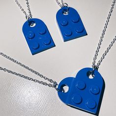 Blue Lego Heart Necklace Includes 2 Separate Necklaces That Connect To Form A Heart :) Super Cute For Couples Or Best Friends! Each Chain Is 18 Inches And Silver Plated, With Lobster Clasps (Available To Ship Within 1-5 Business Days Of Purchase) #Lego #Heart #Necklace #Legohearts #Gift Lego Heart Necklace Blue, Lego Heart Necklace, Bestie Jewelry, Lego Necklace, Lego Heart, Lego Jewelry, Couples Necklace, Lego Gifts, Butterfly Necklace Gold