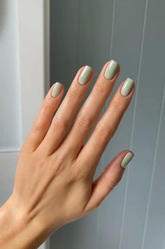 Elevate your manicure game with these chic sage green nail designs! Find inspo and ideas that are perfect for spring – just like these short light sage green nails! Pastel Green Gel Nails Short, Spring 24 Nails Short, Nails Ideas For Spring 2024, Olive Short Nails, Spring Coloured Nails, Pale Green Gel Nails, Sage Green Nail Color, Spring Nail Art Green, Spring Nail Simple