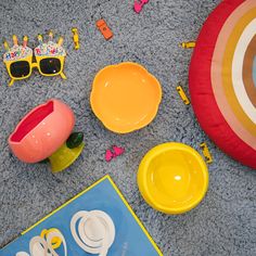 the toys are laid out on the carpet