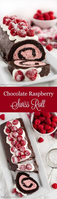 chocolate raspberry swiss roll cake on a white platter with raspberries