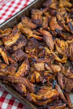 the meat is cooked and ready to be put in the oven on the tablecloth