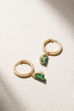 House of Meraki's 18-karat gold hoop earrings are strung with Gemfields Zambian emeralds charms that'll capture any gaze. Love them? Explore our Fine Jewelry edit that showcases Gargi Rathi's love for the stone across an array of pieces. Green Tarnish-resistant Huggie Jewelry, Teardrop Emerald Yellow Gold Jewelry, Gold Plated Hoop Jewelry With Dangling Charms, Green Gold-plated Tarnish-resistant Hoop Earrings, Green Tarnish-resistant Gold-plated Hoop Earrings, Green Tarnish-resistant Hoop Jewelry, Green Gemstone Hoop Earrings In Fine Jewelry Style, Solitaire Emerald Earring In Fine Jewelry, Yellow Gold Dangle Hoop Earrings With Gemstones