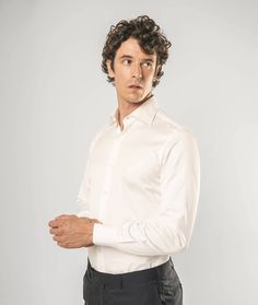 Cotton shirt with a French collarLARUSMIANI's cotton shirt offers unparalleled comfort and fit. The French collar and mother-of-pearl buttons make this garment special and elegant. collarSeventeen handcrafted stepsLily-stitched mother-of-pearl buttonsRemovable staysMade in Italy100% cottonWash separately and inside out at 30 degreesDo not use bleachDo not tumble dryIron with a warm iron Luxury Slim Fit Long Sleeve Dress Shirt, Luxury Slim Fit Semi-formal Top, Luxury Slim Fit Tops For Formal Occasions, Luxury Slim Fit Top For Semi-formal Occasions, Elegant Tailored Shirt With Lapel Collar, Luxury Fitted Dress Shirt With Button Closure, Elegant Business Casual Shirt With Button Closure, Elegant Slim Fit Top With Fold Down Collar, Elegant Business Casual Shirt