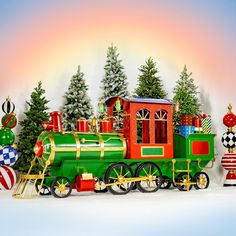 Still large enough for a child (or smaller person) to actually fit in, this train can be showcased both indoors and outdoors since it is skillfully crafted from powder coated iron. Christmas Tree Train, Cardboard Fireplace, Christmas Village Display, Christmas Yard Decorations, Village Display, Metal Christmas, Front Lawn, Christmas Yard, Christmas Train