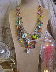 Gypsy in My Soul: Vintage Assemblage Necklace Charms Evil Eyes Hamsa Hand and Amulets GOOD LUCK PROTECTION. $178.00, via Etsy. Bohemian Multicolor Charms Jewelry, Multicolor Bohemian Jewelry With Vintage Charm, Multicolor Bohemian Vintage Charm Jewelry, Bohemian Multicolor Vintage Charm Jewelry, Mardi Gras Festival, Vintage Assemblage Necklace, Vintage Jewelry Diy, 2023 Ideas, 1970s Jewelry