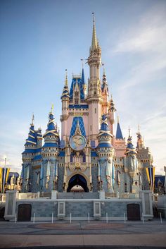 a large castle with a clock on it's side