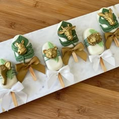 some kind of dessert with gold and green decorations