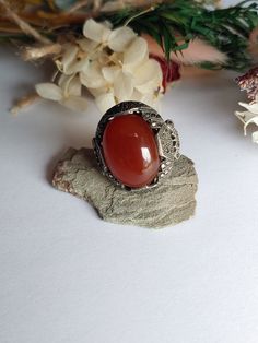 "Vintage 1920s Sterling Silver Art Deco Carnelian & Marcasite Ring Size is right about 5.75\" There is wear from age, please see pictures. **NOTE THAT THERE ARE SOME MISSING MARCASITE STONES**  Basic info: Size- Approx. 5.75\" US Color: Silver / Red Type- Silver work  Cut- Oval weight- approx. 7.8g Silver Mark-  Sterling Maker Mark - N/A  SHIPPING: All orders are guaranteed to ship the same or following day. If your purchase occurs on a Sunday you may request UPS shipment as the post office is closed. Shipping in the United States usually takes 3-4 days" Vintage Silver Carnelian Rings, Vintage Oval Crystal Ring With Large Stone, Vintage Crystal Ring With Cabochon, Antique Carnelian Rings For Anniversary, Vintage Carnelian Ring For Formal Occasions, Vintage Filigree Ring With Cabochon, Vintage Oval Cabochon Crystal Ring, Vintage Oval Carnelian Rings, Vintage Carnelian Gemstone Rings