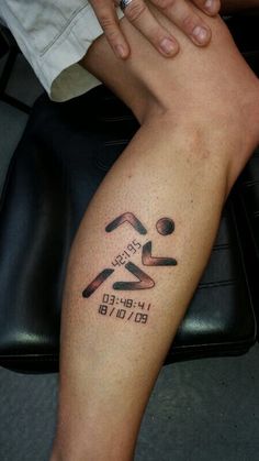 a person with a tattoo on their leg