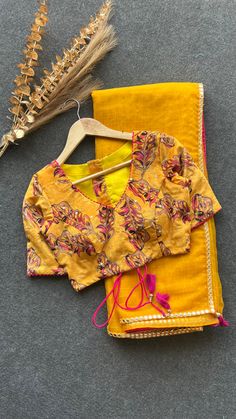 Product Descriptions : Yellow checked pure organza designer saree with mirror embroidery border works comes with yellow micro velvet floral embroidery worked blouse & stitched blouse as shown. View this post on Instagram A post shared by Handcrafted Sarees by Shobana Nithin (@threadslabel_india)